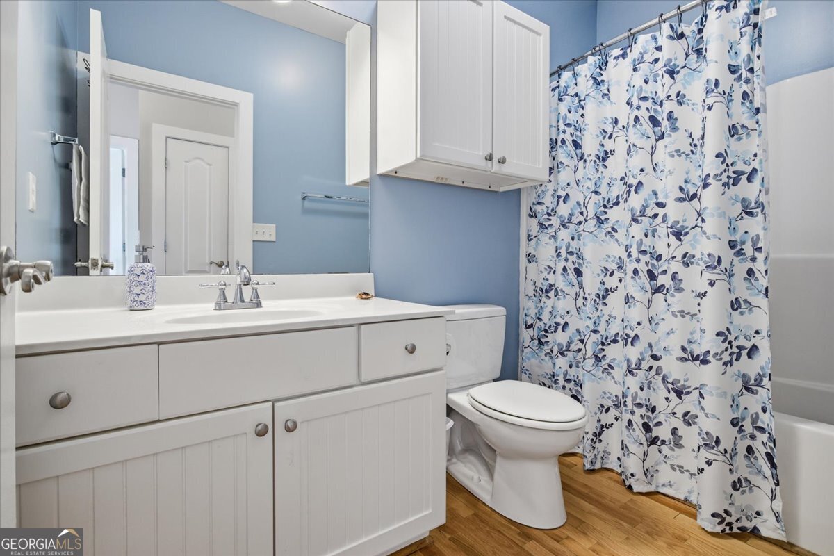 204 Staples Dairy Road Carrollton, GA 30116 - Photo 32 of 85 a bathroom with a sink toilet and a shower