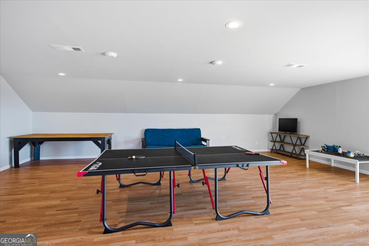 204 Staples Dairy Road Carrollton, GA 30116 - Photo 35 of 85 a living room with furniture and wooden floor