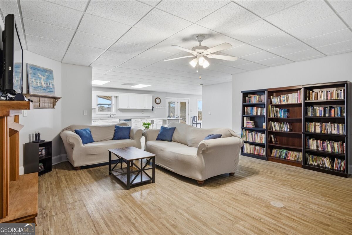 204 Staples Dairy Road Carrollton, GA 30116 - Photo 44 of 85 a living room with furniture and a flat screen tv
