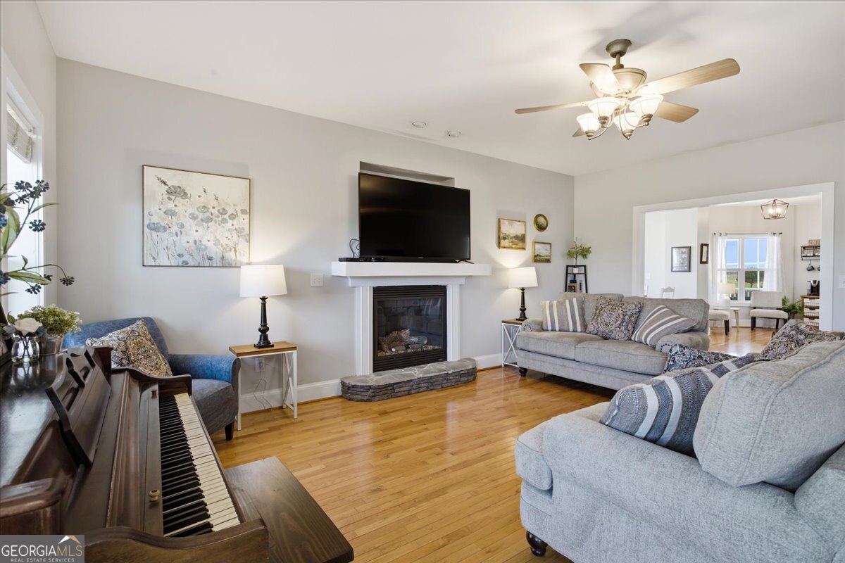 204 Staples Dairy Road Carrollton, GA 30116 - Photo 6 of 85 a living room with furniture and a flat screen tv