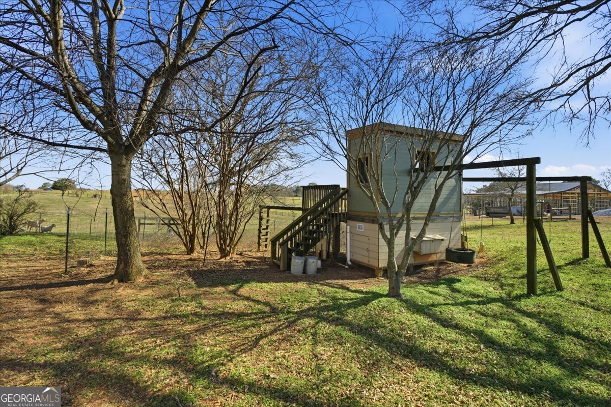 204 Staples Dairy Road Carrollton, GA 30116 - Photo 71 of 85 a view of backyard with wooden fence