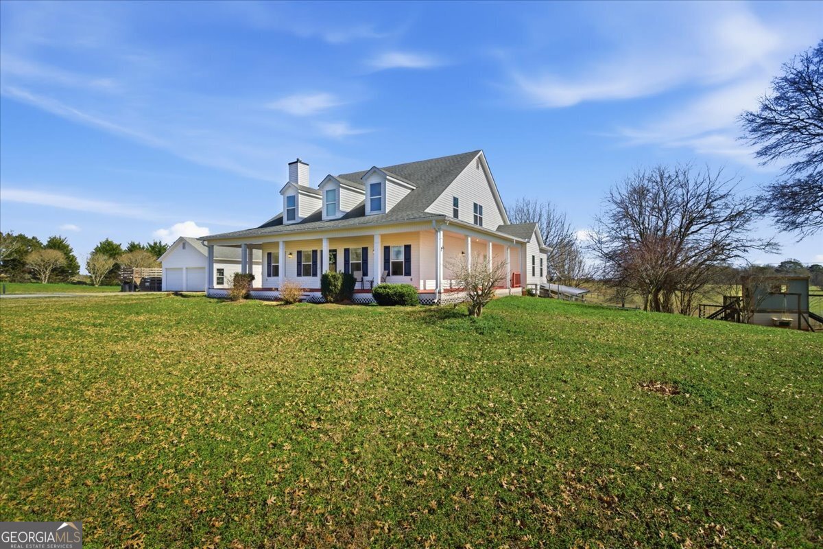204 Staples Dairy Road Carrollton, GA 30116 - Photo 74 of 85 a front view of house with yard and green space