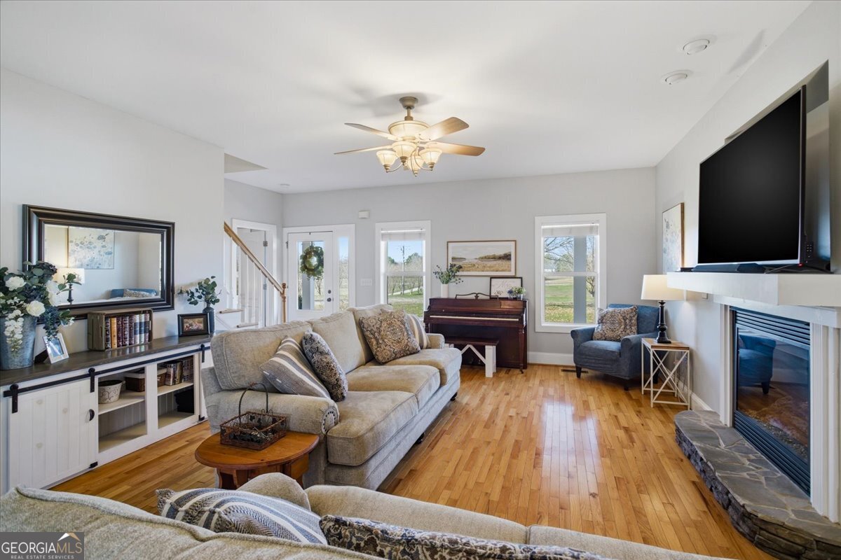 204 Staples Dairy Road Carrollton, GA 30116 - Photo 8 of 85 a living room with furniture fireplace and flat screen tv