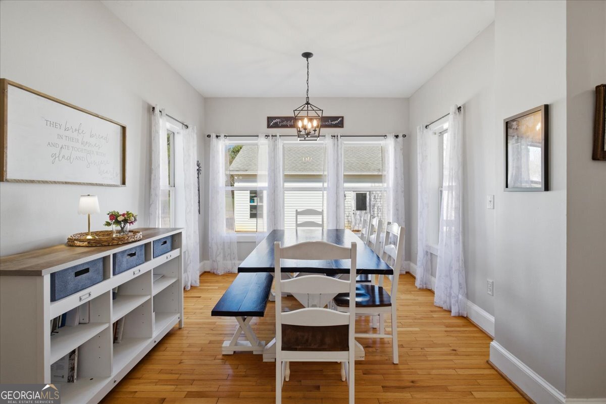 204 Staples Dairy Road Carrollton, GA 30116 - Photo 10 of 85 a view of a livingroom with furniture window and wooden floor
