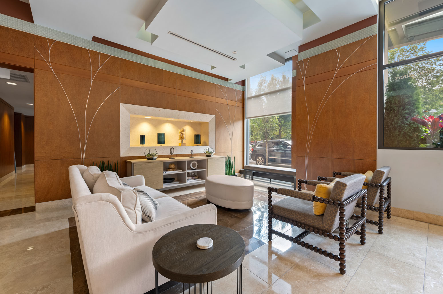 849 North Franklin Street, Unit 715 Chicago, IL 60610 - Photo 2 of 26 a living room with furniture and a large window