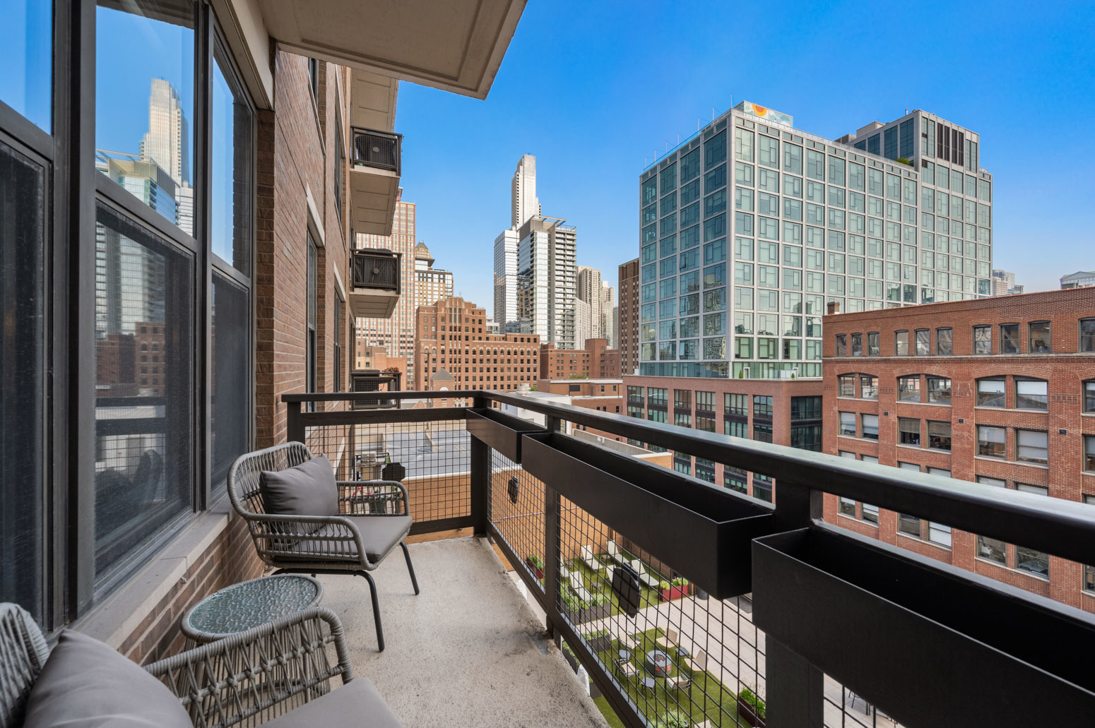 849 North Franklin Street, Unit 715 Chicago, IL 60610 - Photo 6 of 26 a city view with tall buildings