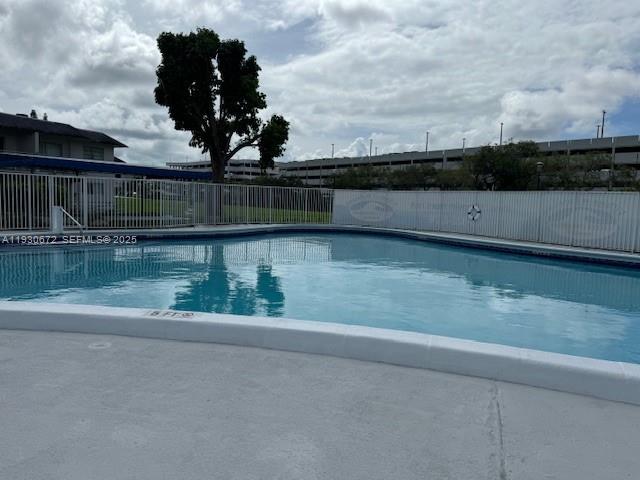7350 Southwest 82nd Street, Unit C125 Miami, FL 33143 - Photo 6 of 12 a view of a lake