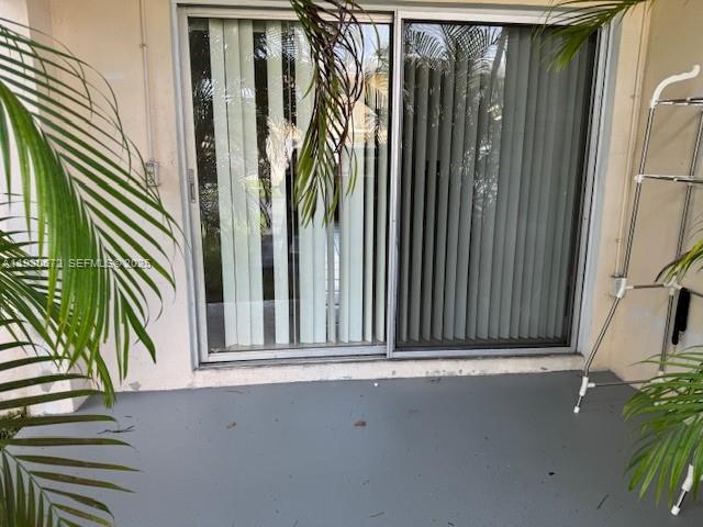 7350 Southwest 82nd Street, Unit C125 Miami, FL 33143 - Photo 9 of 12 a view of a house with a street