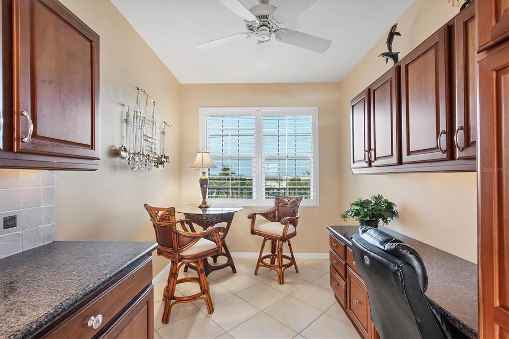 13113 Gasparilla Road, Unit 403 Placida, FL 33946 - Photo 11 of 53 a dining room with furniture and window