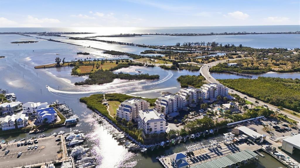 13113 Gasparilla Road, Unit 403 Placida, FL 33946 - Photo 2 of 53 a view of a city and ocean view