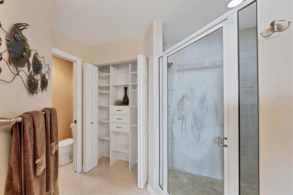 13113 Gasparilla Road, Unit 403 Placida, FL 33946 - Photo 25 of 53 a bathroom with a shower and a glass door