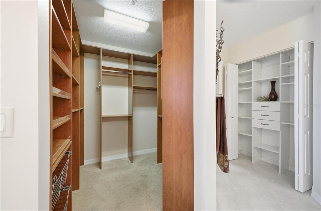 13113 Gasparilla Road, Unit 403 Placida, FL 33946 - Photo 28 of 53 a view of walk in closet with clothes and shoes