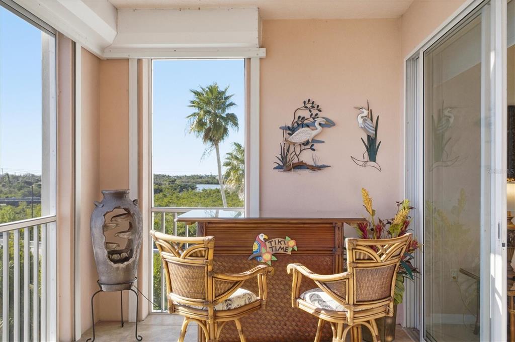 13113 Gasparilla Road, Unit 403 Placida, FL 33946 - Photo 33 of 53 a view of a dining room with furniture window and outside view
