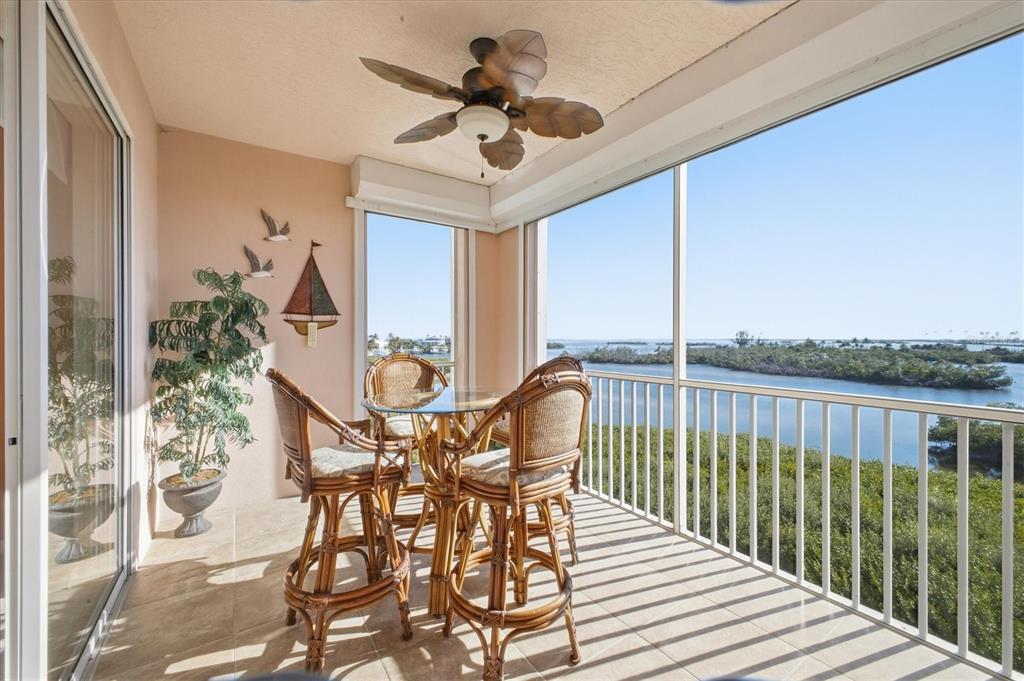 13113 Gasparilla Road, Unit 403 Placida, FL 33946 - Photo 36 of 53 a view of a balcony with furniture