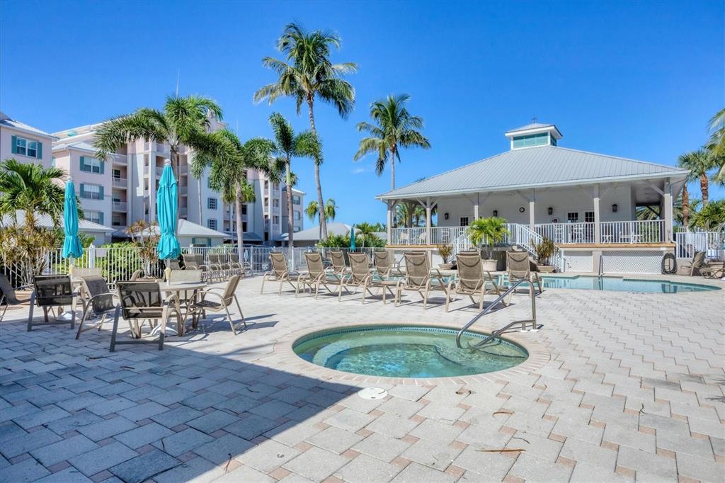 13113 Gasparilla Road, Unit 403 Placida, FL 33946 - Photo 47 of 53 a view of a house with backyard and sitting area