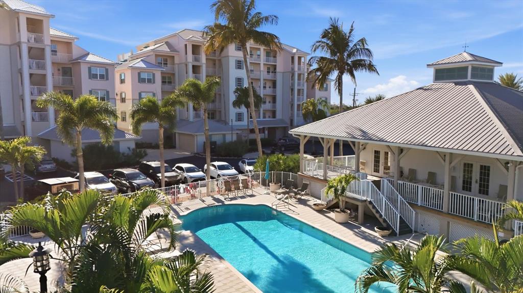 13113 Gasparilla Road, Unit 403 Placida, FL 33946 - Photo 53 of 53 a view of multiple houses with a yard