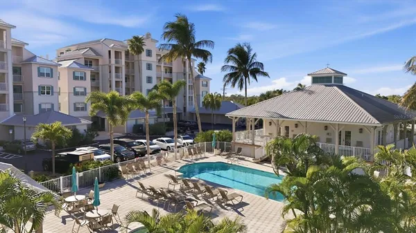 a view of multiple houses with a yard