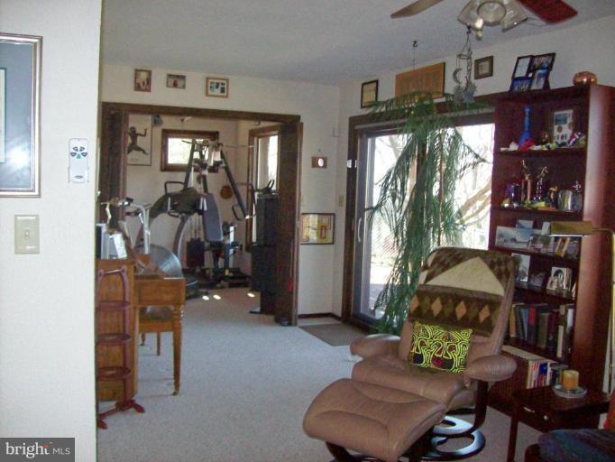 1704 Dahlgren Road Middletown, MD 21769 - Photo 14 of 17 a living room with furniture and a window
