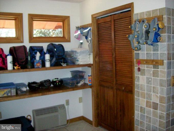 1704 Dahlgren Road Middletown, MD 21769 - Photo 15 of 17 a kitchen with a cabinets and a stove