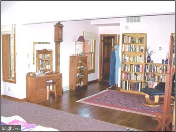 1704 Dahlgren Road Middletown, MD 21769 - Photo 5 of 17 a living room with furniture and a table