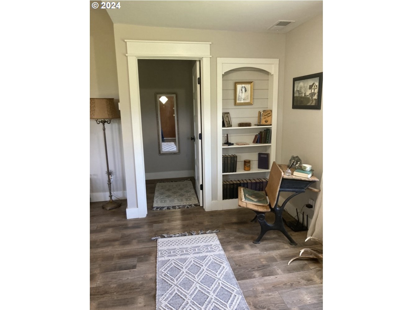 43756 Eagle Creek Road Richland, OR 97870 - Photo 7 of 21 a living room with a chair and a table with closet