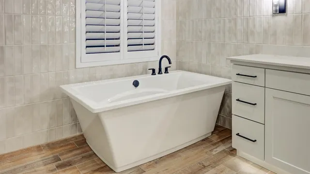 a utility room with a sink dryer and washer