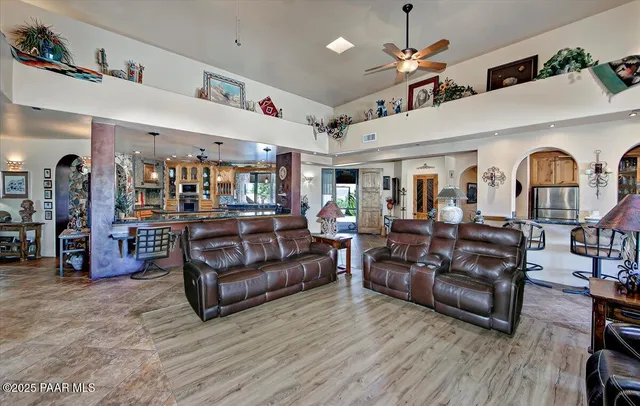 a kitchen with stainless steel appliances granite countertop a stove oven and a sink