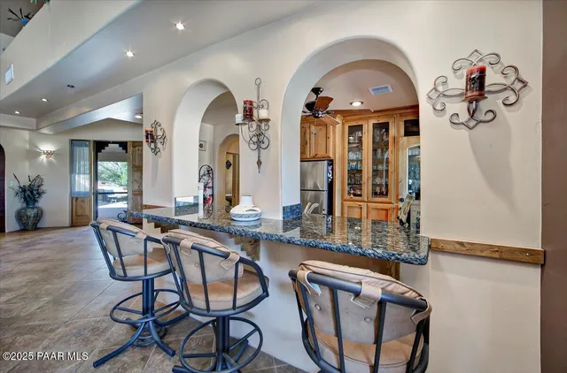 a view of a workspace with furniture and toys