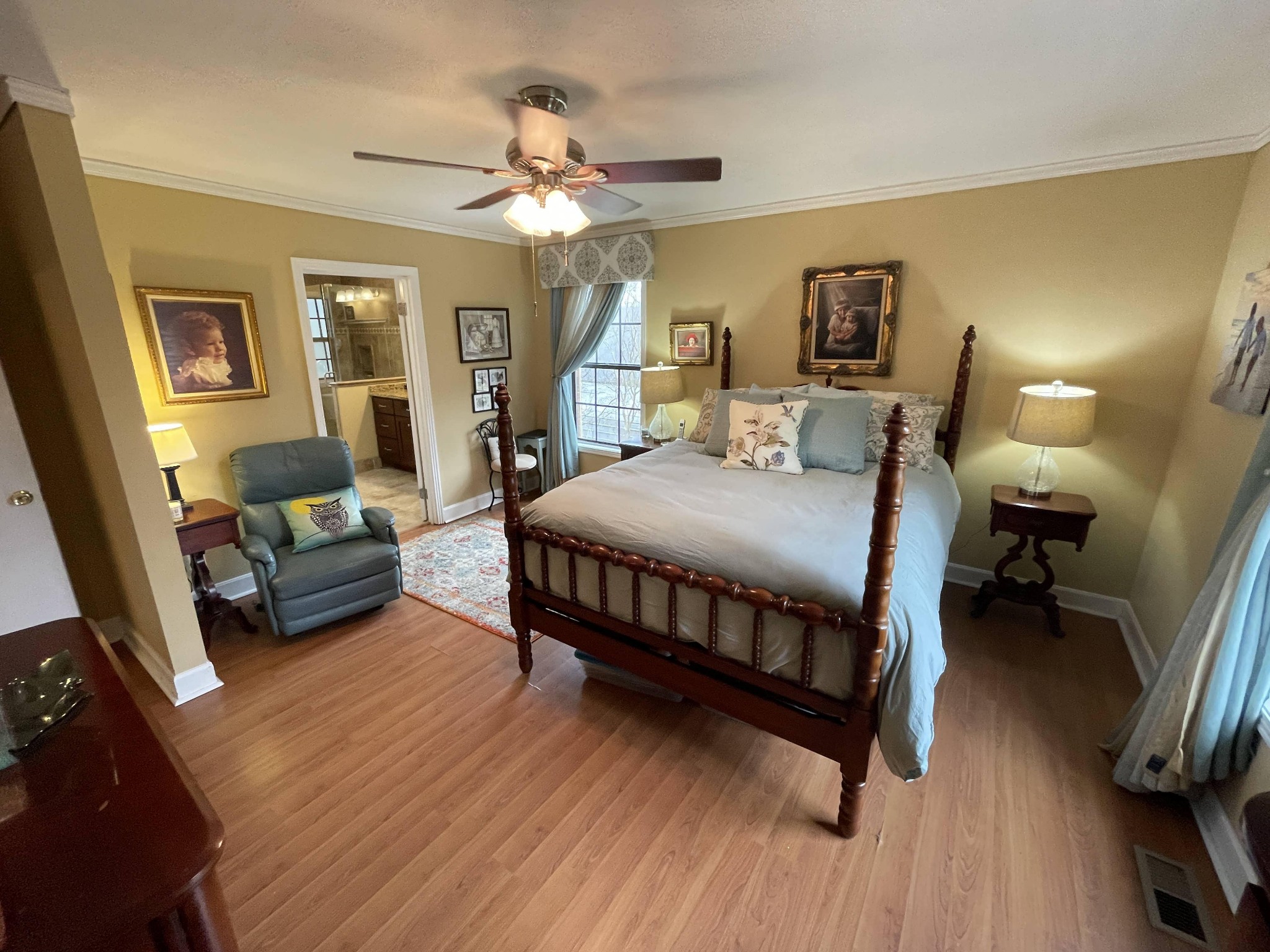5131 Hickory Ridge Road Lebanon, TN 37090 - Photo 14 of 19 a bedroom with a bed a couch and dresser