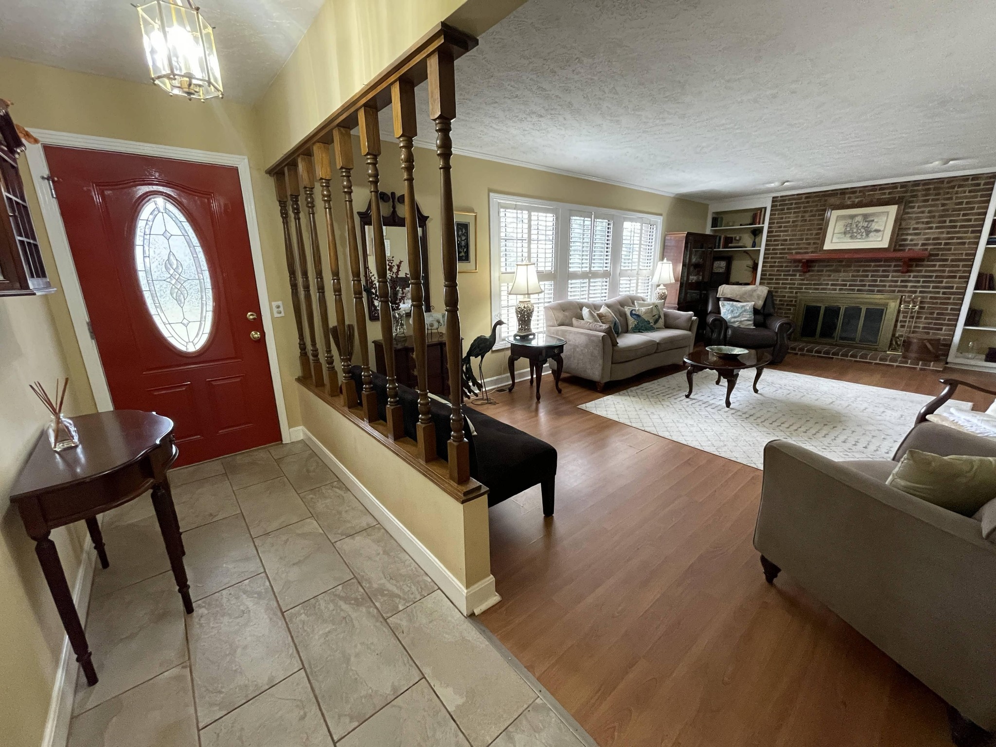 5131 Hickory Ridge Road Lebanon, TN 37090 - Photo 3 of 19 a living room with patio furniture and a flat screen tv