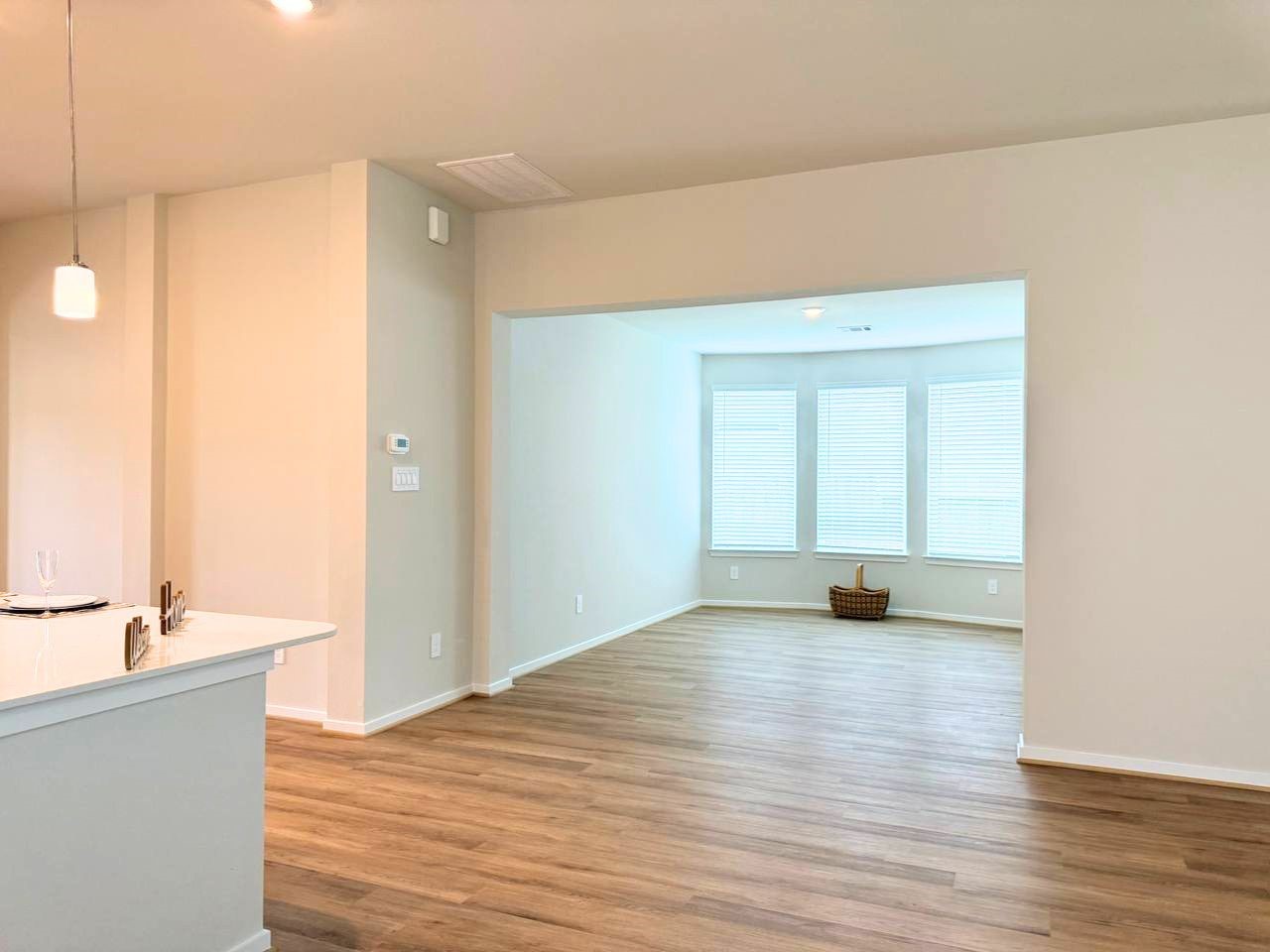 16246 Parish Pointe Court Conroe, TX 77302 - Photo 11 of 32 a view of a room with wooden floor and sink