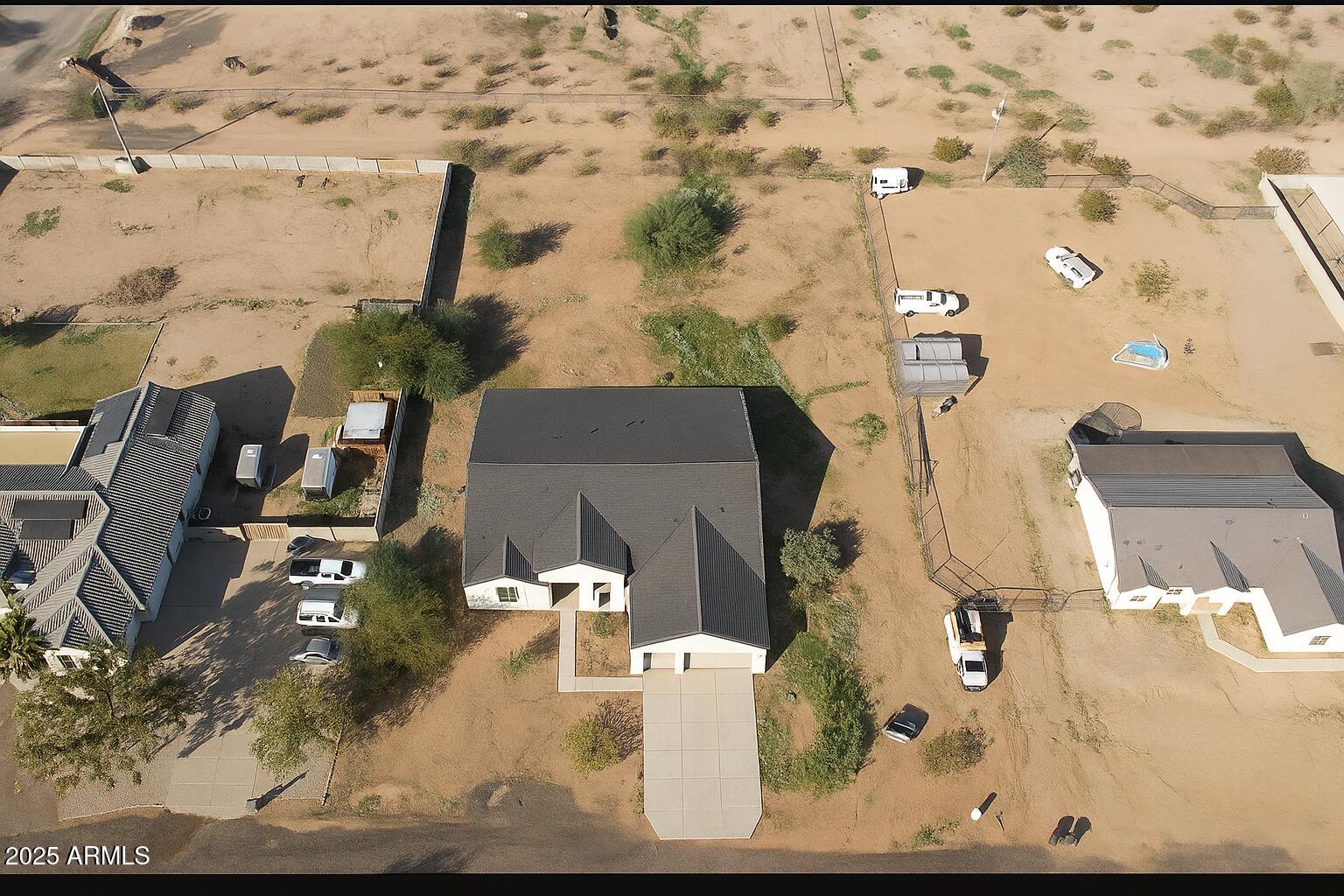 No No Address Wittmann, AZ 85361 - Photo 5 of 6 an aerial view of residential houses with outdoor space