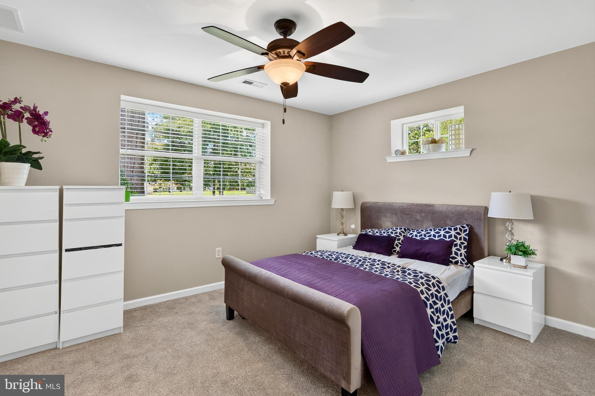 246 Oak Park Road Hatfield, PA 19440 - Photo 14 of 45 a bedroom with a bed and a potted plant
