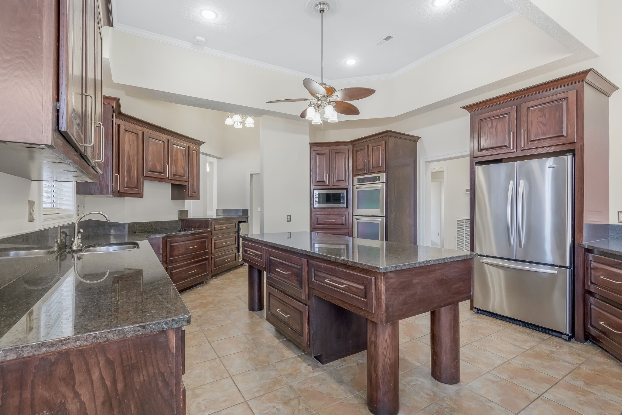 555 Randall Hitchcock Road Rock Island, TN 38581 - Photo 11 of 86 a kitchen with stainless steel appliances granite countertop a refrigerator and a stove