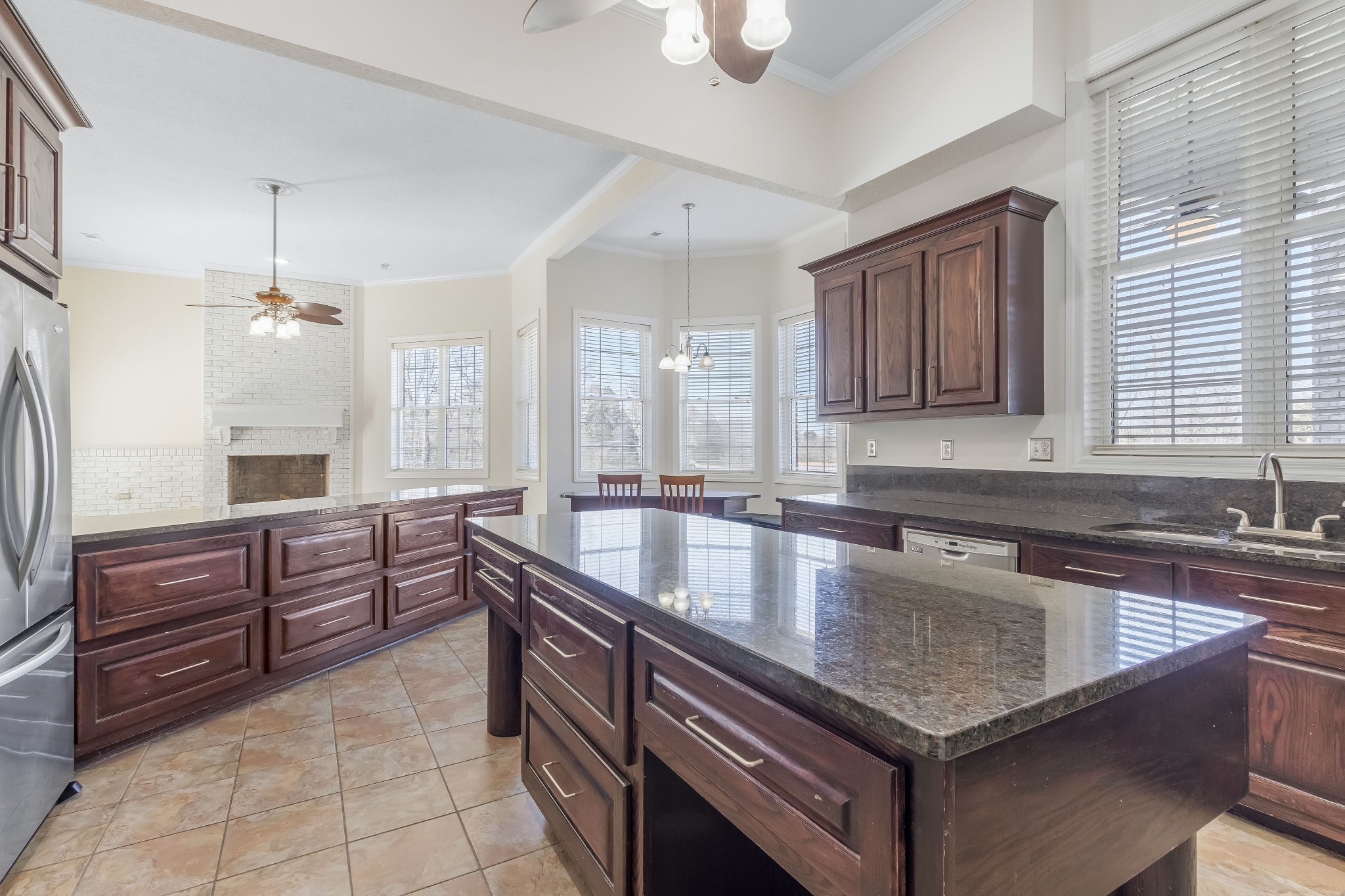 555 Randall Hitchcock Road Rock Island, TN 38581 - Photo 13 of 86 a kitchen with granite countertop a sink a counter space appliances and cabinets