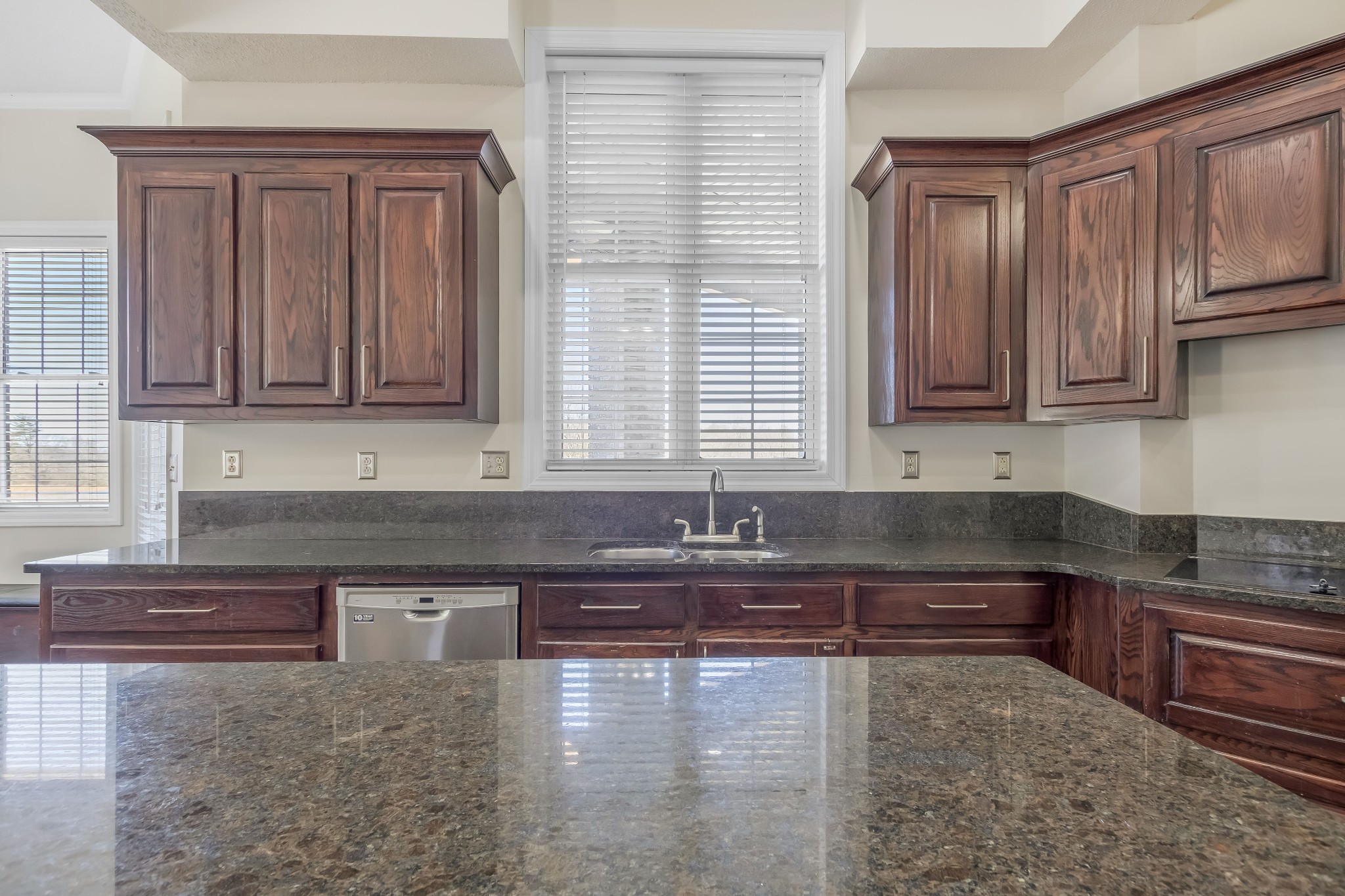 555 Randall Hitchcock Road Rock Island, TN 38581 - Photo 14 of 86 a kitchen with granite countertop a sink a stove and cabinets