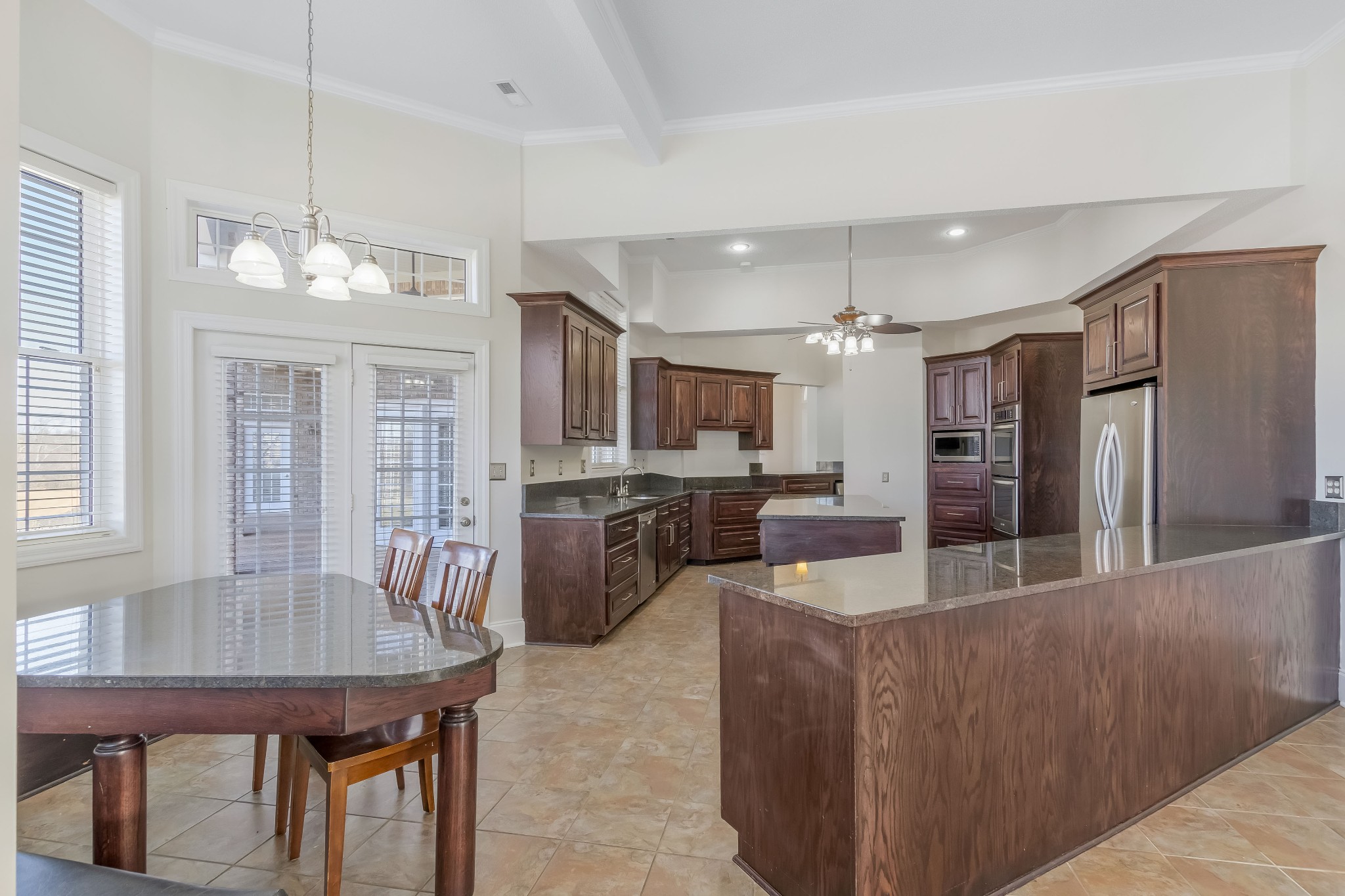 555 Randall Hitchcock Road Rock Island, TN 38581 - Photo 19 of 86 a view of a dining room with furniture window and wooden floor