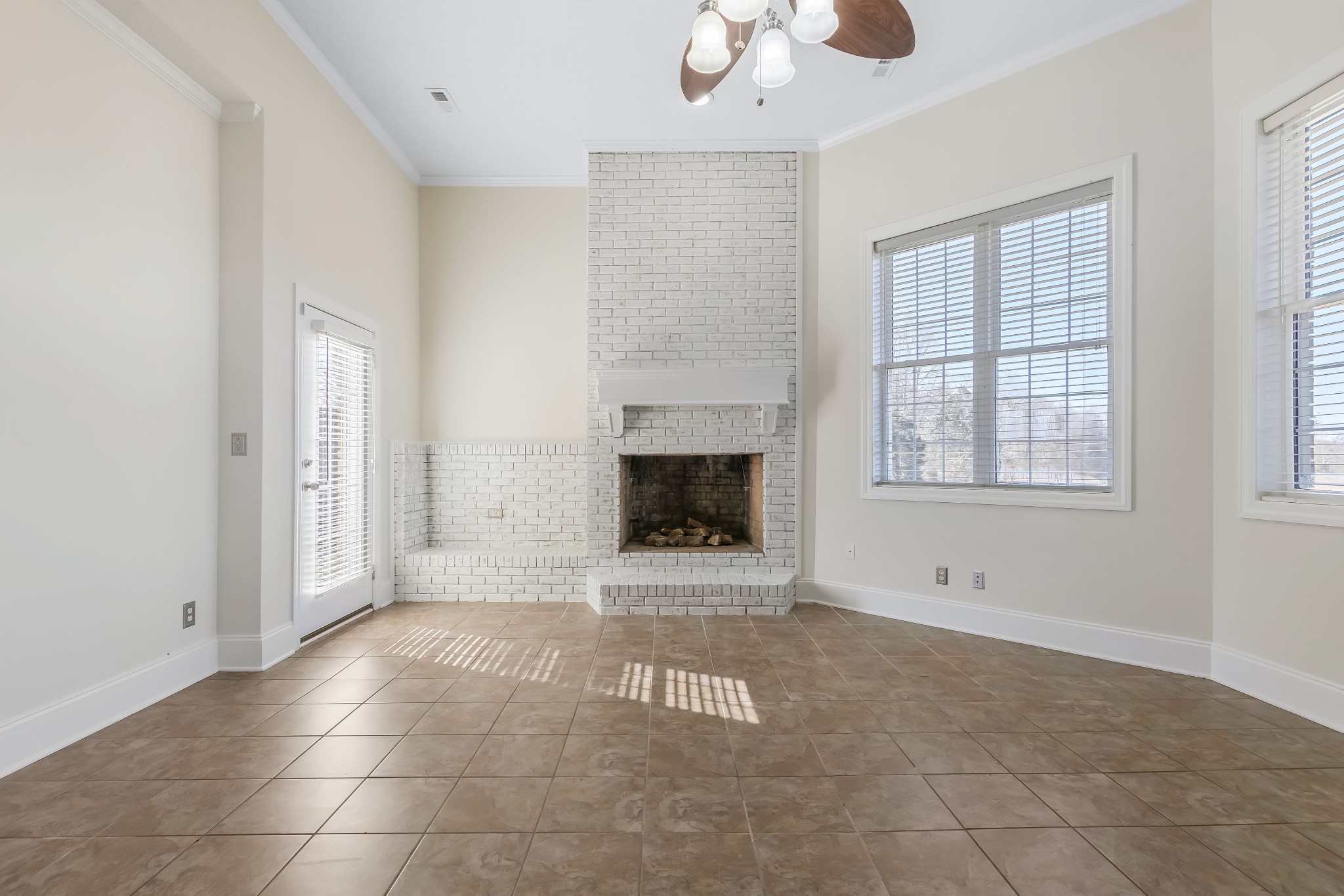 555 Randall Hitchcock Road Rock Island, TN 38581 - Photo 21 of 86 a view of an empty room with a fireplace and a window