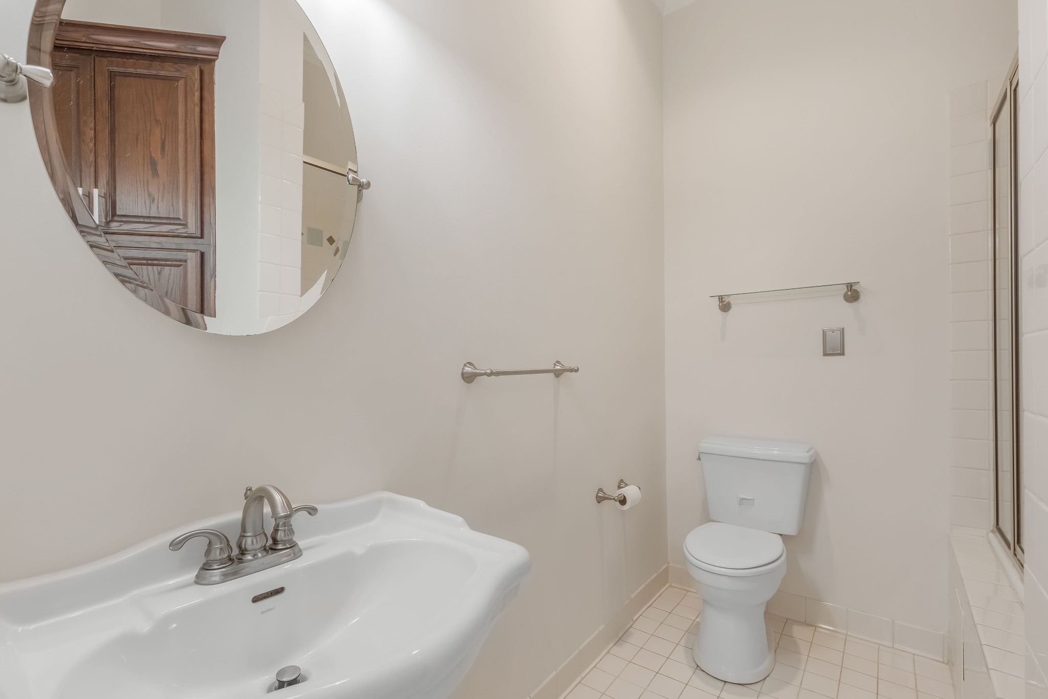 555 Randall Hitchcock Road Rock Island, TN 38581 - Photo 36 of 86 a bathroom with a toilet a sink and mirror