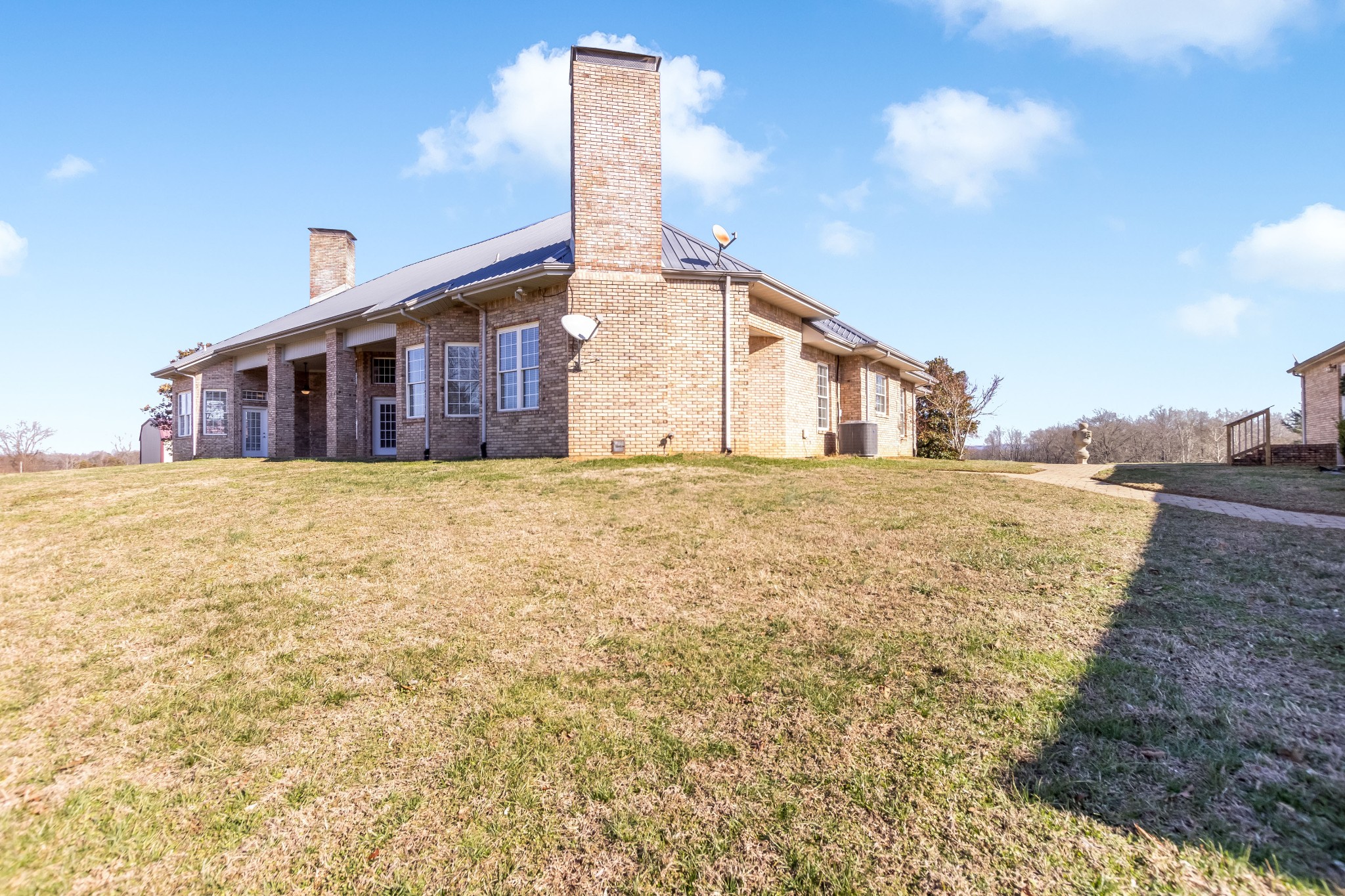 555 Randall Hitchcock Road Rock Island, TN 38581 - Photo 51 of 86 a big house with a big yard and large trees