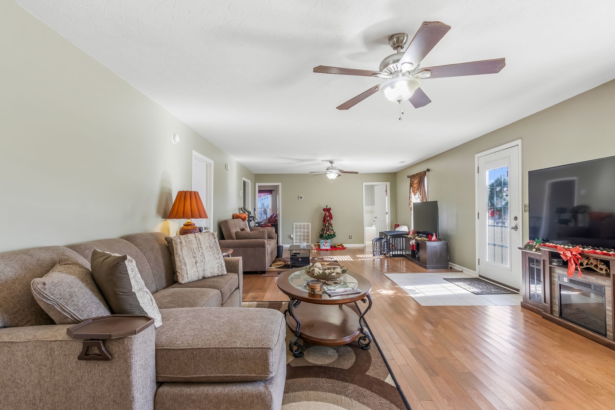 555 Randall Hitchcock Road Rock Island, TN 38581 - Photo 62 of 86 a living room with furniture and a flat screen tv