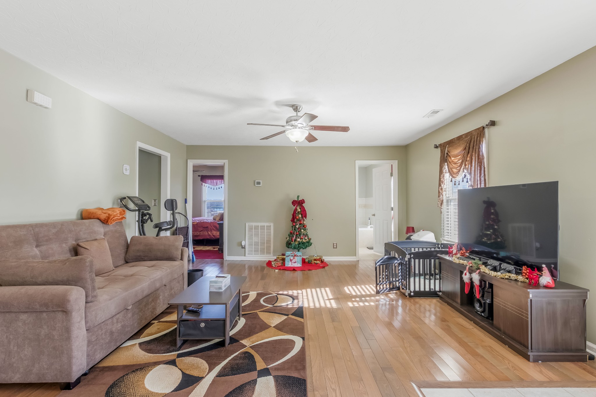 555 Randall Hitchcock Road Rock Island, TN 38581 - Photo 63 of 86 a living room with furniture and a flat screen tv