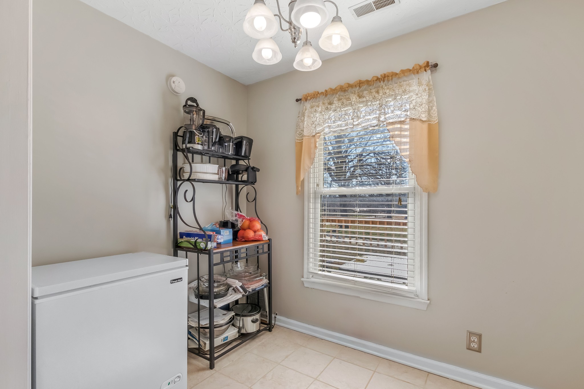 555 Randall Hitchcock Road Rock Island, TN 38581 - Photo 67 of 86 a view of a storage & utility room with a window