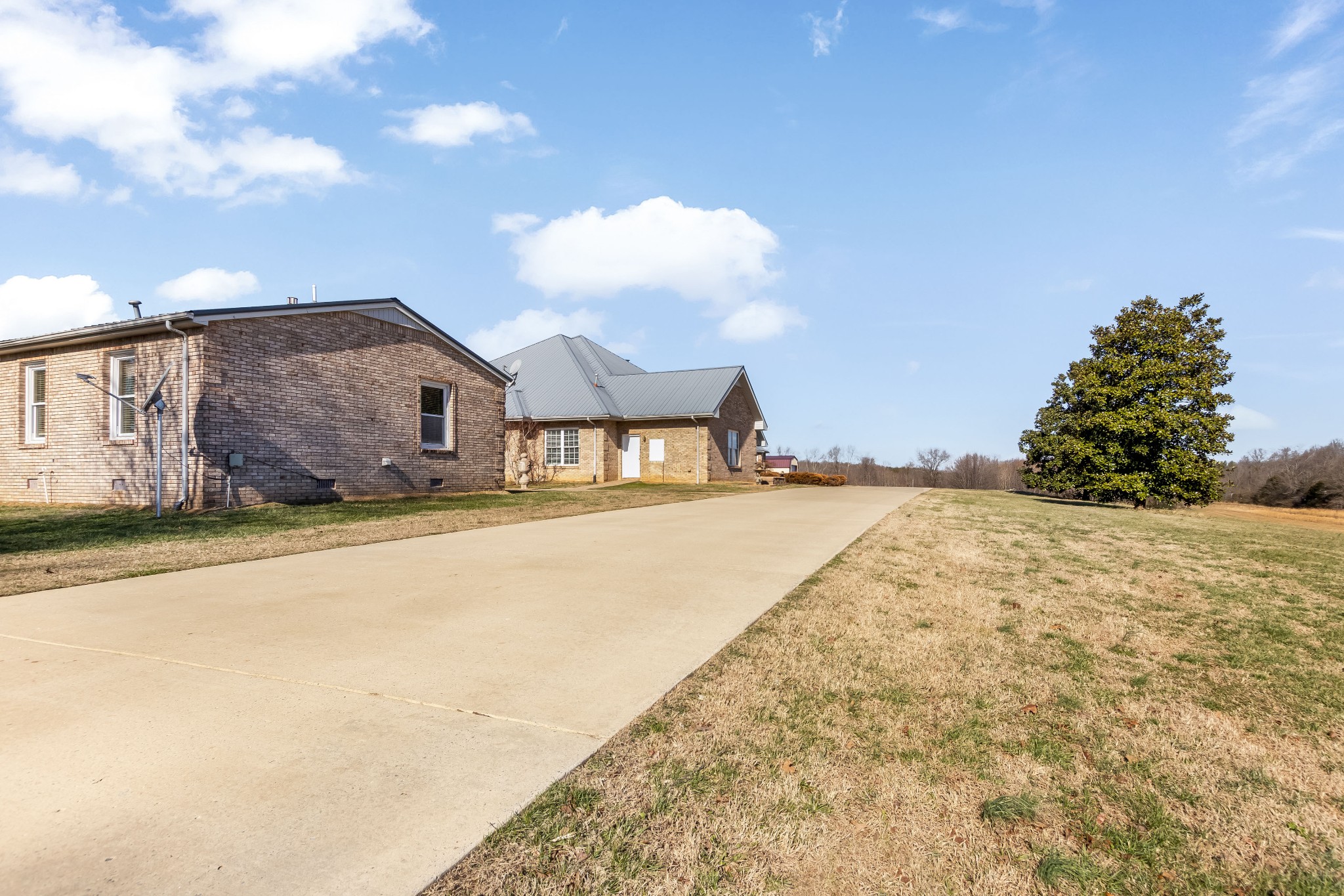 555 Randall Hitchcock Road Rock Island, TN 38581 - Photo 77 of 86 a front view of a house with a yard and garage