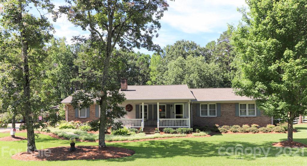 294 Holiday Road Lancaster, SC 29720 - Photo 1 of 48 a front view of a house with a yard