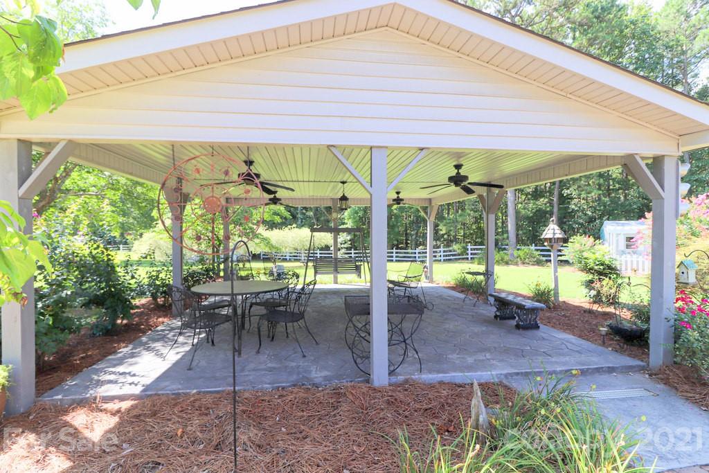 294 Holiday Road Lancaster, SC 29720 - Photo 11 of 48 a house view with a seating space and garden space
