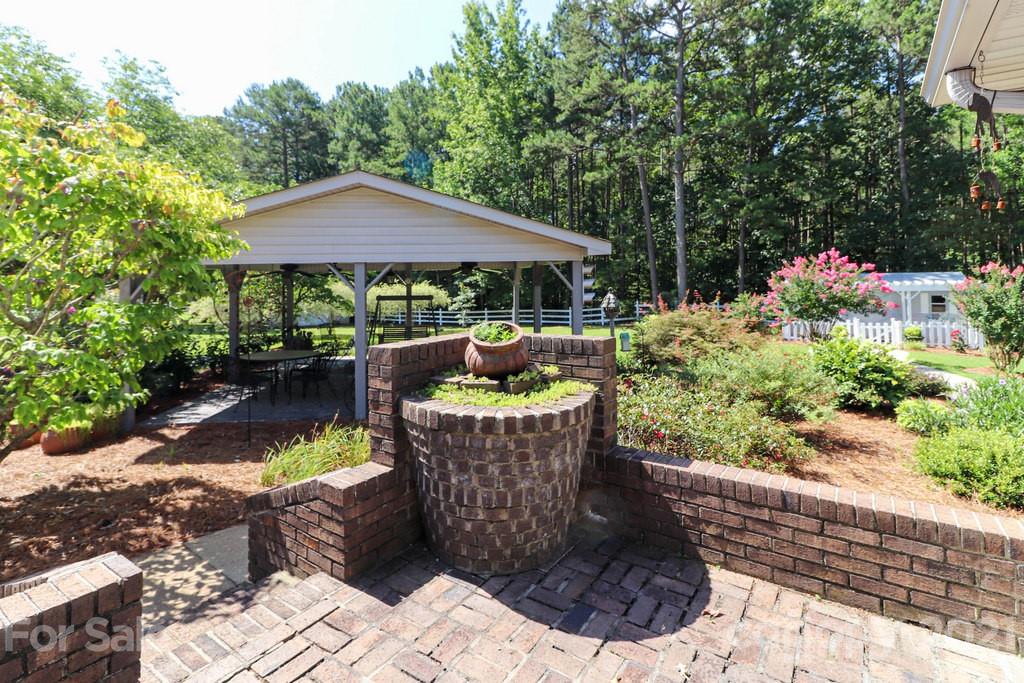 294 Holiday Road Lancaster, SC 29720 - Photo 13 of 48 a view of a swimming pool with a patio