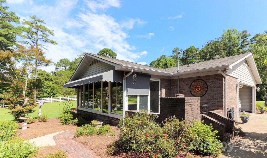 294 Holiday Road Lancaster, SC 29720 - Photo 14 of 48 a front view of a house with garden