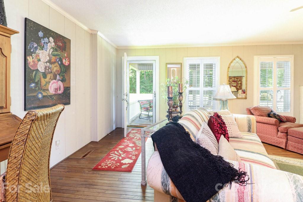 294 Holiday Road Lancaster, SC 29720 - Photo 20 of 48 a living room with furniture and large windows