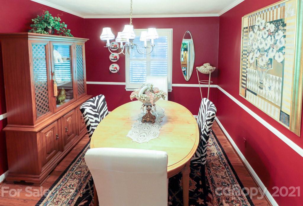 294 Holiday Road Lancaster, SC 29720 - Photo 24 of 48 a dining room with furniture and chandelier